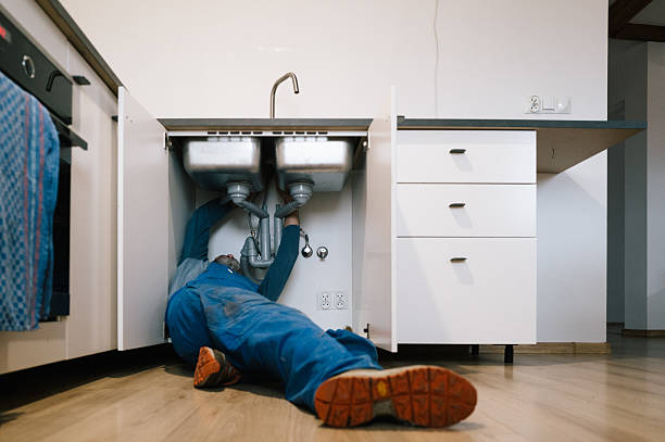 Professional Plumbing technician working in Sterling, CT